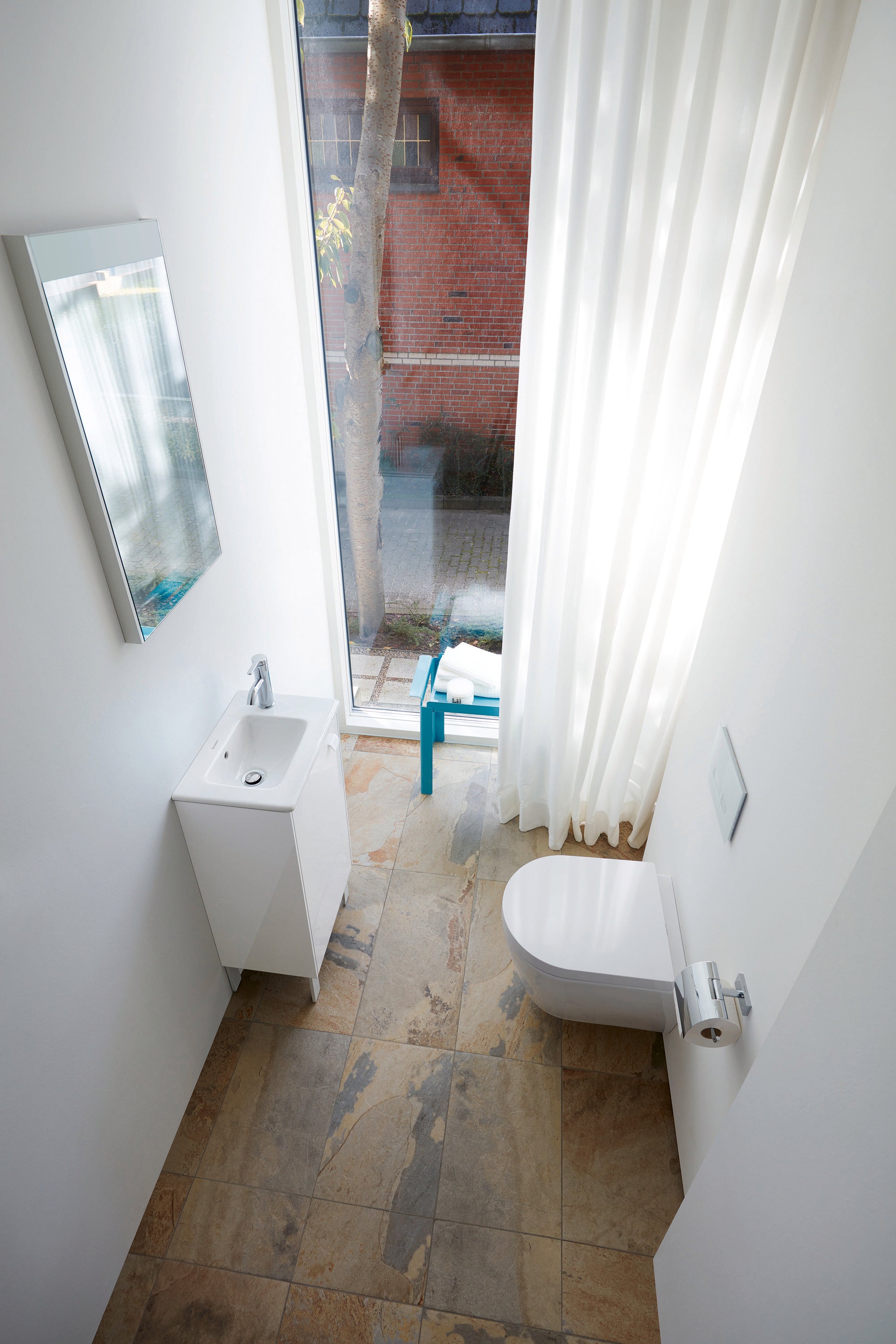 ME by Starck 1.28/0.8 GPF Dual Flush Rimless ADA Compliant Round Wall Mounted Toilet in White - Seat, Actuator, and In-Wall Tank and Carrier Sold Separately
