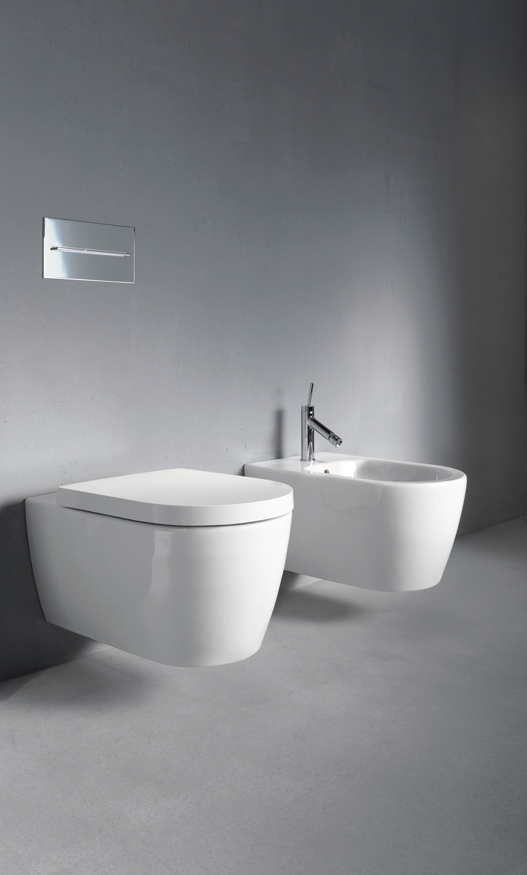 ME by Starck 1.28/0.8 GPF Dual Flush Rimless ADA Compliant Compact Elongated Wall Mounted Toilet in White