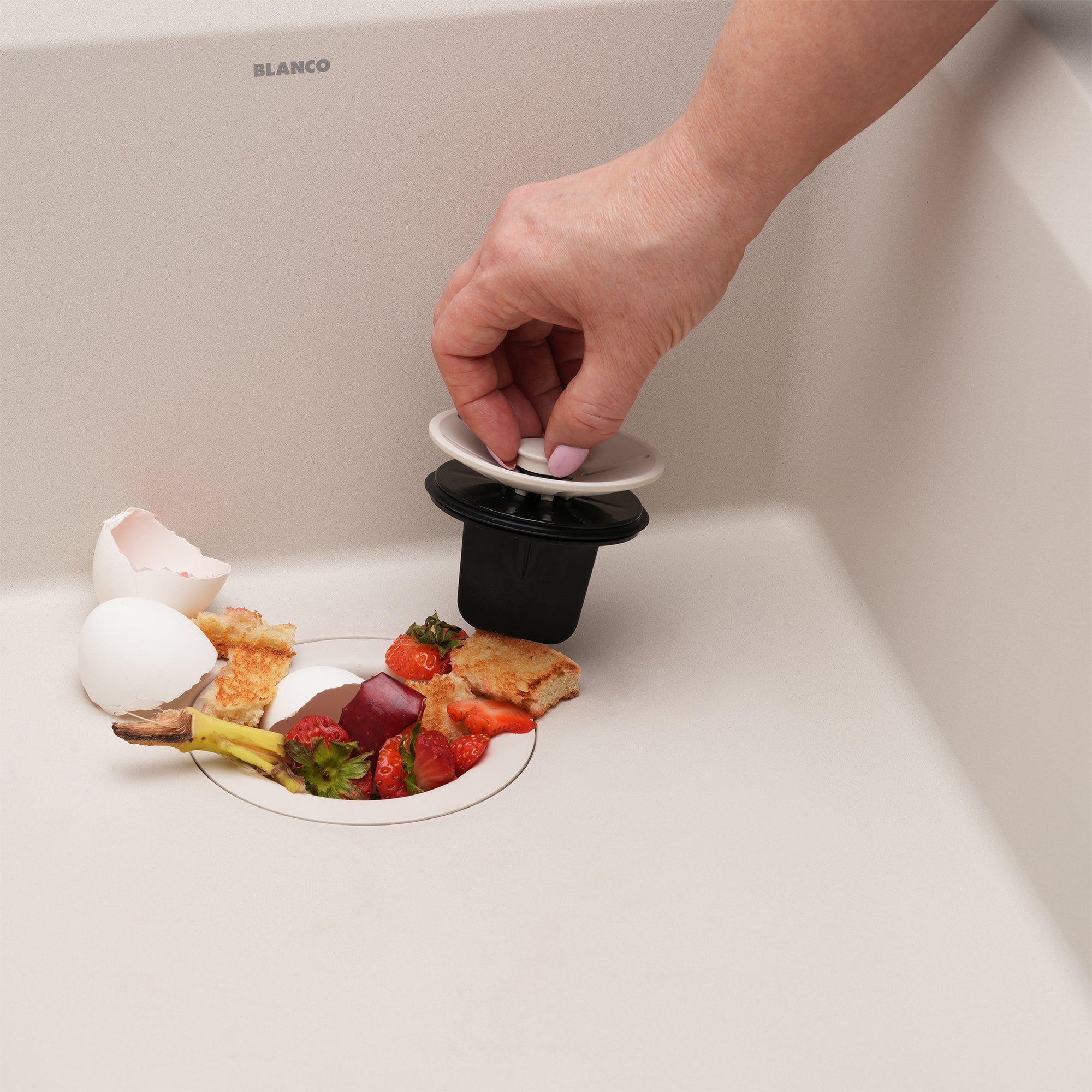 Blanco Essential Silgranit Color-Matched Disposal Flange Drain Insert with Waste Scraper Product Image