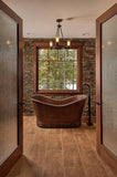 Installation Image of Premier Copper Products 67" Hammered Copper Double Slipper Bathtub, BTD67DB