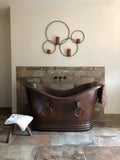 Installation Image of Premier Copper Products 60" Hammered Copper Double Slipper Bathtub With Rings, BTDR60DB