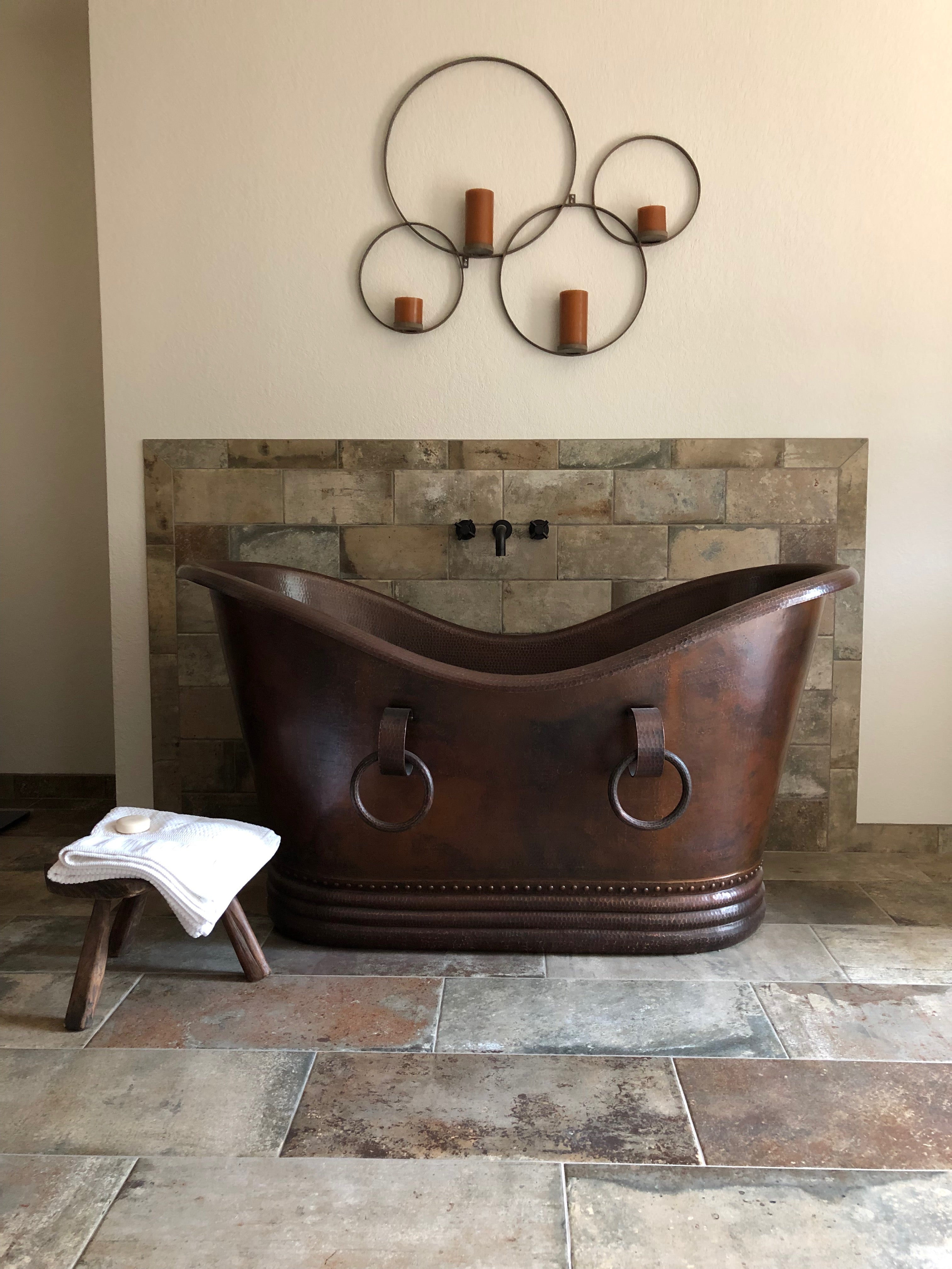 Installation Image of Premier Copper Products 60" Hammered Copper Double Slipper Bathtub With Rings, BTDR60DB