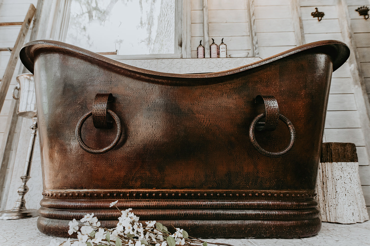 Installation Image of Premier Copper Products 67" Hammered Copper Double Slipper Bathtub With Rings, BTDR67DB