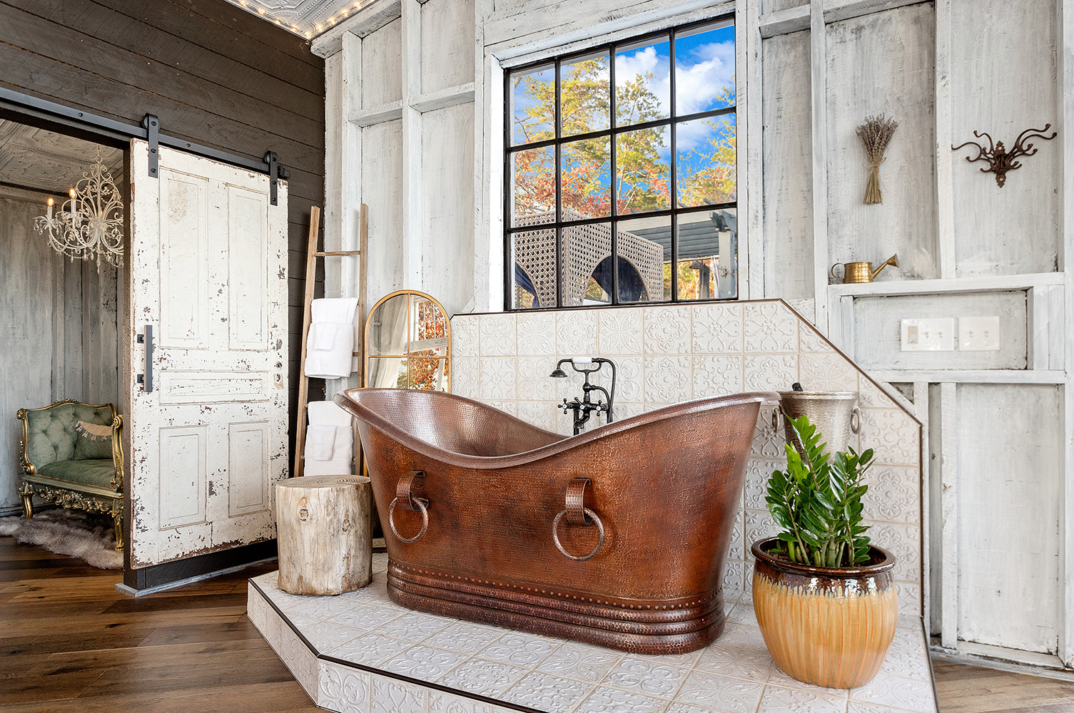Installation Image of Premier Copper Products 67" Hammered Copper Double Slipper Bathtub With Rings, BTDR67DB