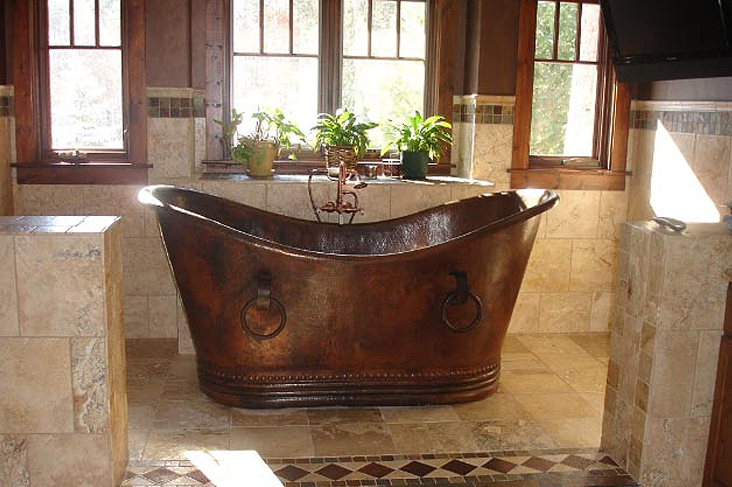 Installation Image of Premier Copper Products 67" Hammered Copper Double Slipper Bathtub With Rings, BTDR67DB