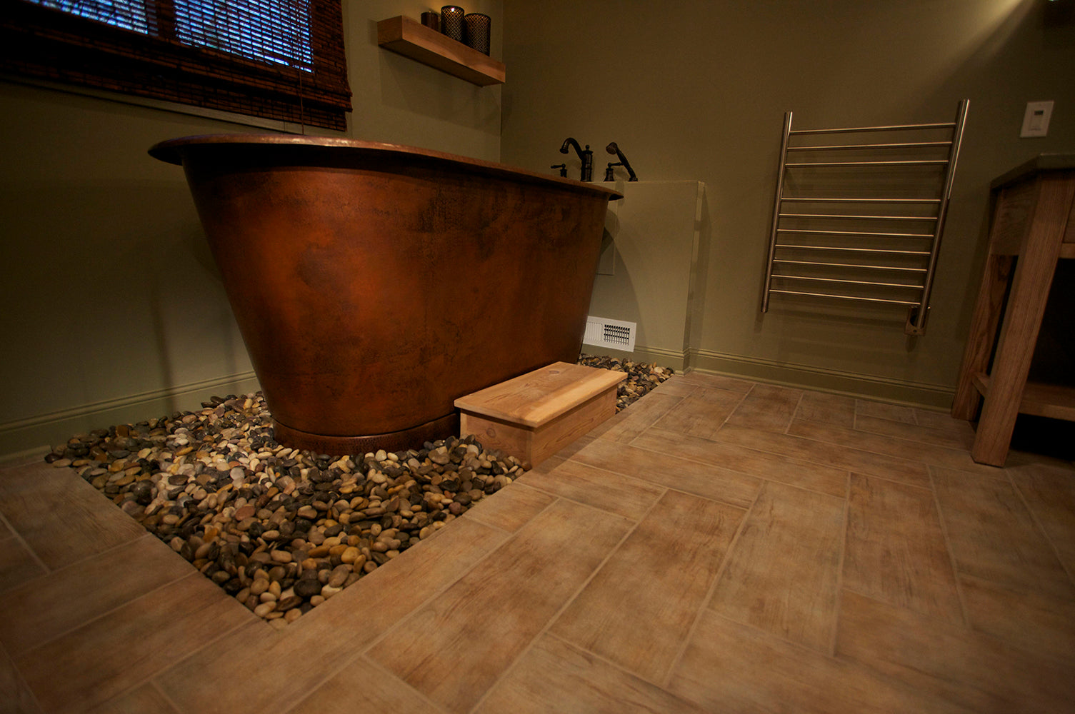 Installation Image of Premier Copper Products 72" Hammered Copper Modern Style Bathtub, BTM72DB