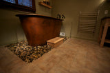 Installation Image of Premier Copper Products 72" Hammered Copper Modern Style Bathtub, BTM72DB