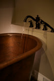 Installation Image of Premier Copper Products 72" Hammered Copper Modern Style Bathtub, BTM72DB