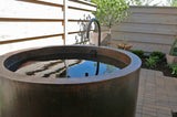 Installation Image of Premier Copper Products Japanese Style Soaker Hammered Copper Bathtub, BTR45DB