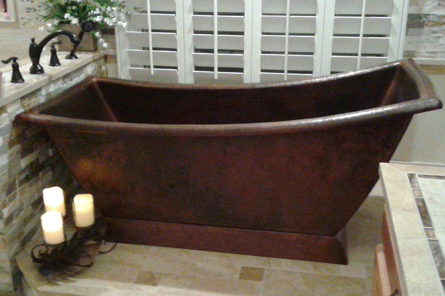 Installation Image of Premier Copper Products 67" Hammered Copper Canoa Single Slipper Bathtub, BTSC67DB