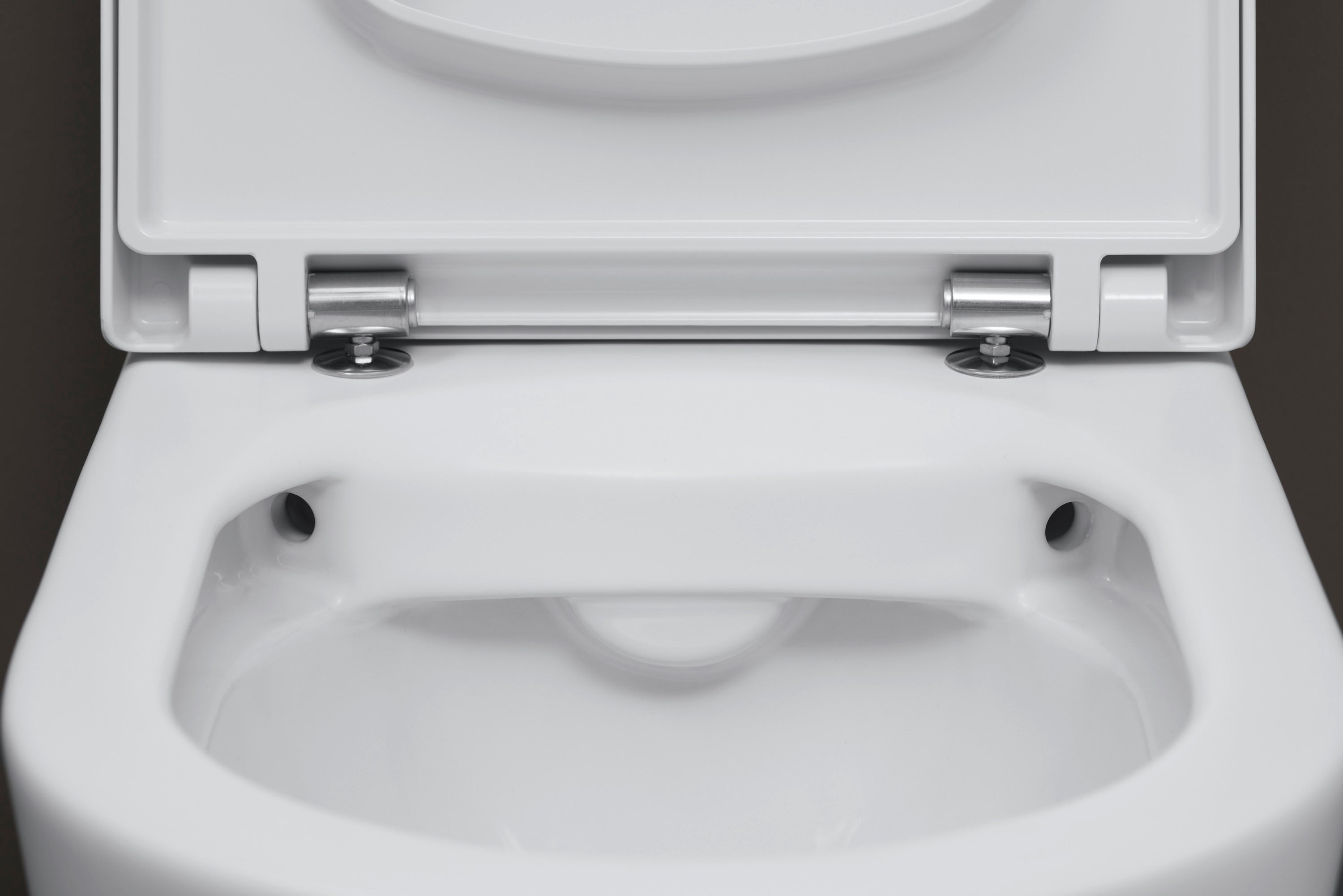 ME by Starck 1.28/0.8 GPF Dual Flush Rimless ADA Compliant Compact Elongated Wall Mounted Toilet in White