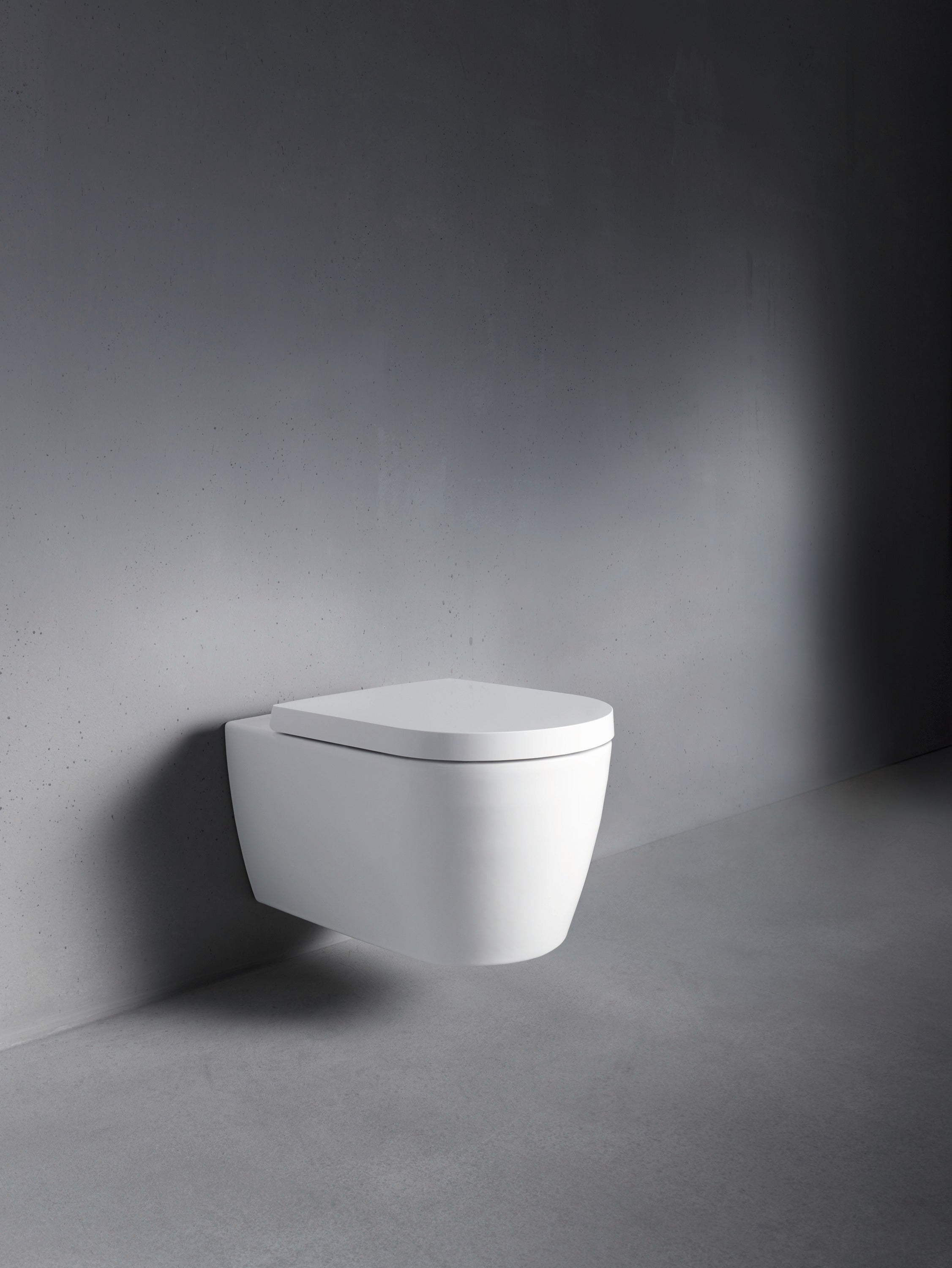 ME by Starck 1.28/0.8 GPF Dual Flush Rimless ADA Compliant Compact Elongated Wall Mounted Toilet in White