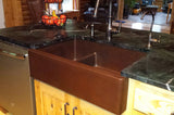 Installation Image of Premier Copper Products 33" Copper Farmhouse Sink, 30/70 Double Bowl, Oil Rubbed Bronze, KA30DB33229-SD5