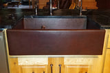 Installation Image of Premier Copper Products 33" Copper Farmhouse Sink, 30/70 Double Bowl, Oil Rubbed Bronze, KA30DB33229-SD5