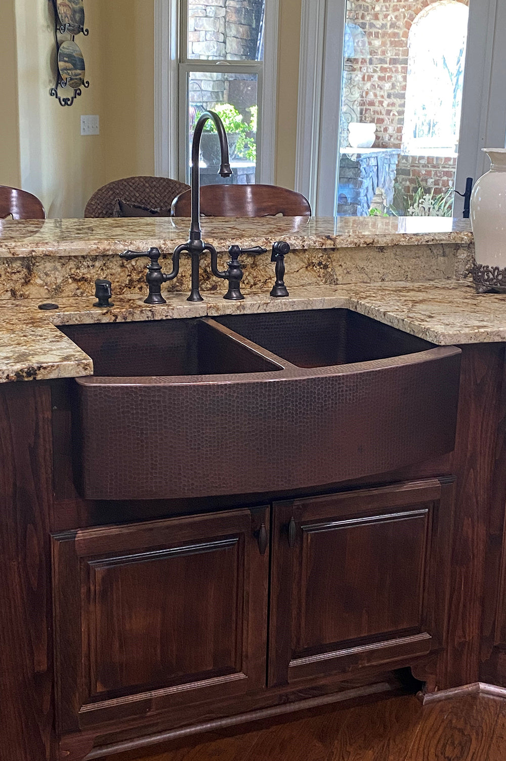 Installation Image of Premier Copper Products 33" Copper Farmhouse Sink, 50/50 Double Bowl, Oil Rubbed Bronze, KA50RDB33249