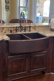 Installation Image of Premier Copper Products 33" Copper Farmhouse Sink, 50/50 Double Bowl, Oil Rubbed Bronze, KA50RDB33249