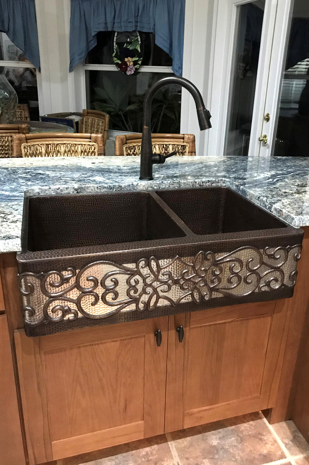Installation Image of Premier Copper Products 33" Copper Farmhouse Sink, 60/40 Double Bowl, Oil Rubbed Bronze and Nickel, KA60DB33229S-NB