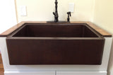 Installation Image of Premier Copper Products 30" Copper Farmhouse Sink, Oil Rubbed Bronze, KASDB30229