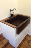 Installation Image of Premier Copper Products 30" Copper Farmhouse Sink, Oil Rubbed Bronze, KASDB30229