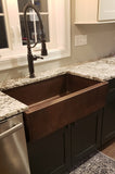 Installation Image of Premier Copper Products 35" Copper Farmhouse Sink, Oil Rubbed Bronze, KASDB35229