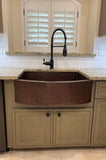 Installation Image of Premier Copper Products 30" Copper Farmhouse Sink, Oil Rubbed Bronze, KASRDB30249