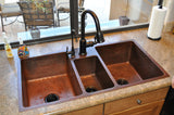 Installation Image of Premier Copper Products 42" Copper Kitchen Sink, 40/20/40 Triple Bowl, Oil Rubbed Bronze, KTDB422210