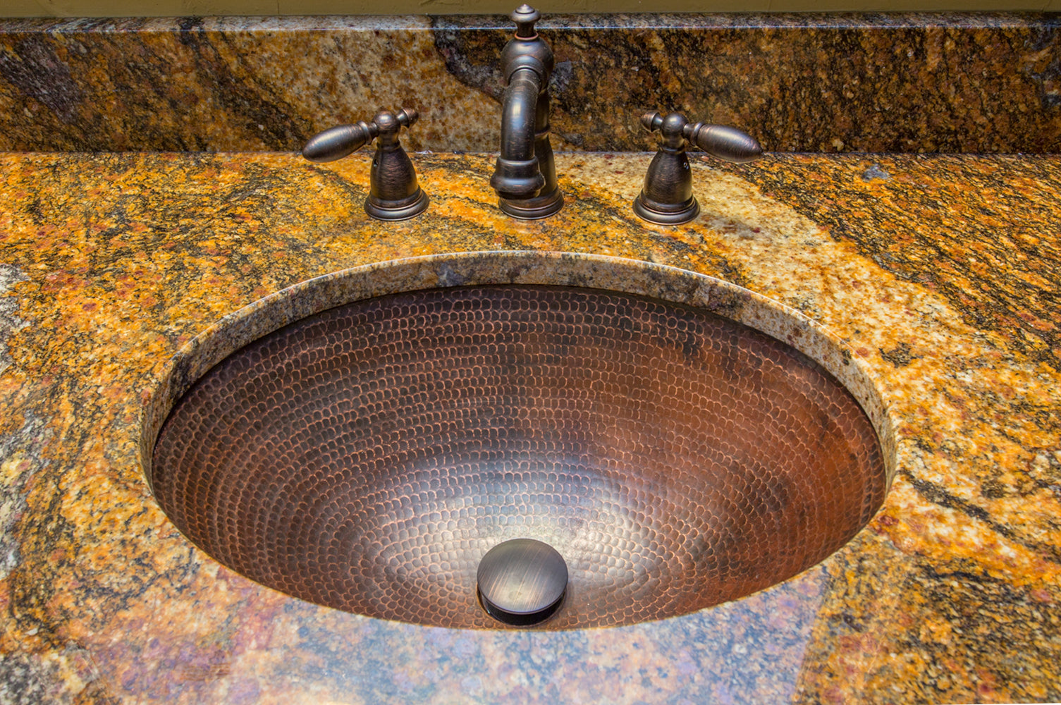 Installation Image of Premier Copper Products 17" Oval Copper Bathroom Sink, Oil Rubbed Bronze, LO17FDB