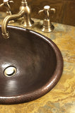 Installation Image of Premier Copper Products 17" Oval Copper Bathroom Sink, Oil Rubbed Bronze, LO17RDB