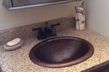 Installation Image of Premier Copper Products 18" Oval Copper Bathroom Sink, Oil Rubbed Bronze, LO18RDB