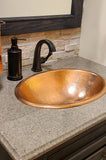 Installation Image of Premier Copper Products 19" Oval Copper Bathroom Sink, Polished Copper, LO19FPC