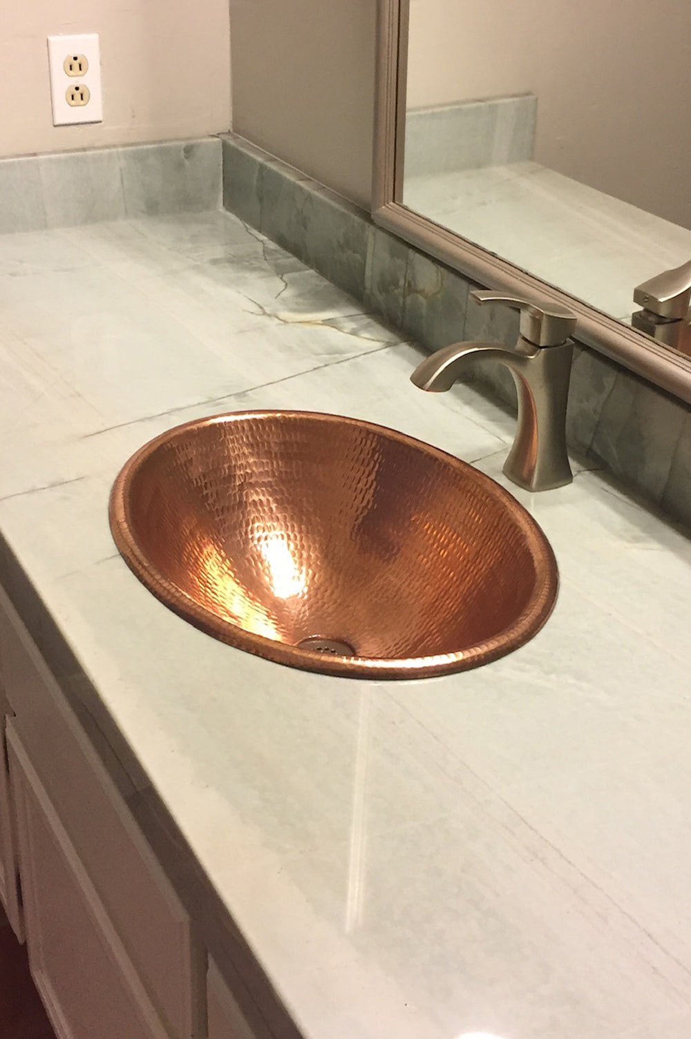 Installation Image of Premier Copper Products 19" Oval Copper Bathroom Sink, Polished Copper, LO19RPC