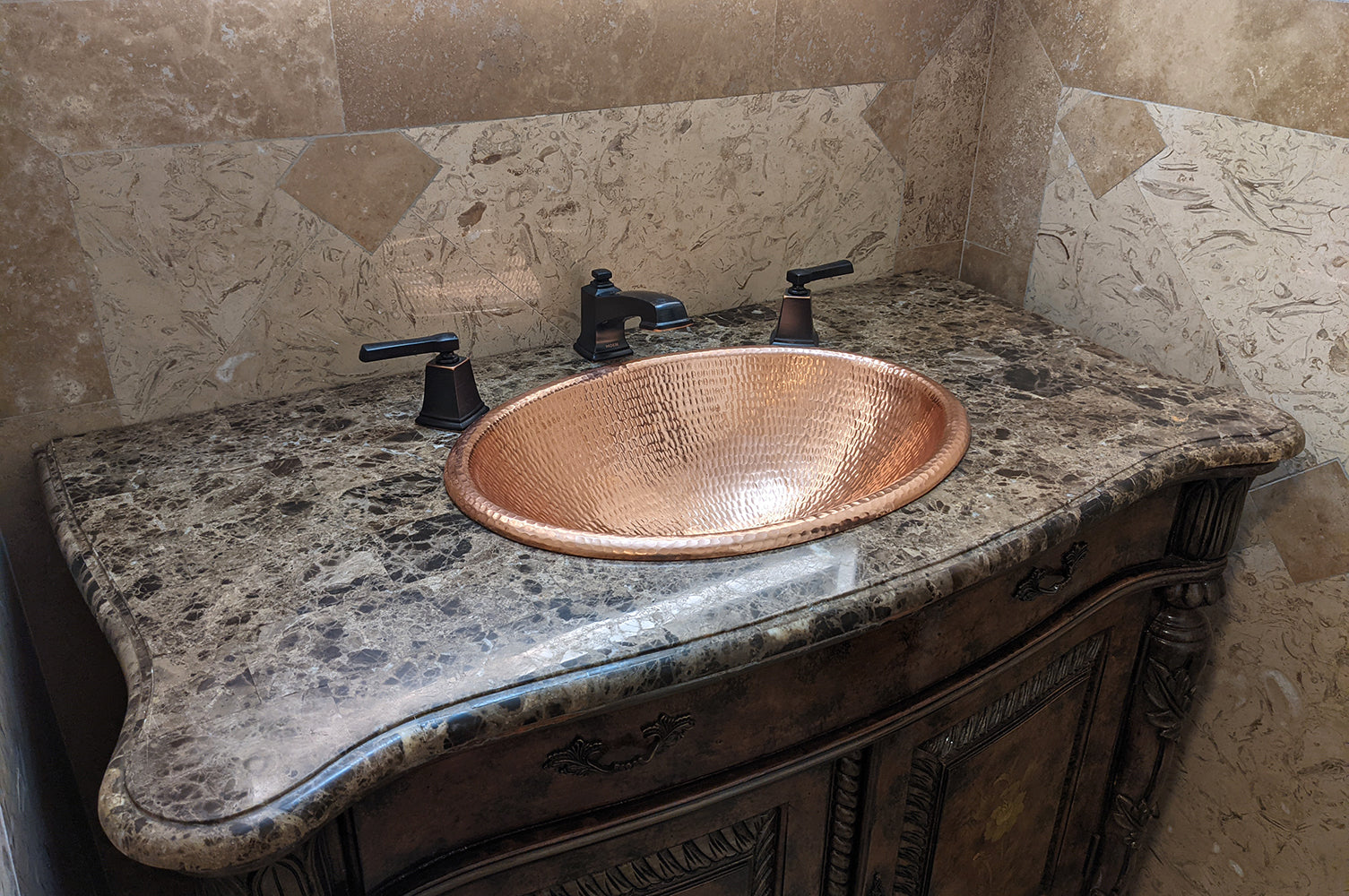 Installation Image of Premier Copper Products 19" Oval Copper Bathroom Sink, Polished Copper, LO19RPC