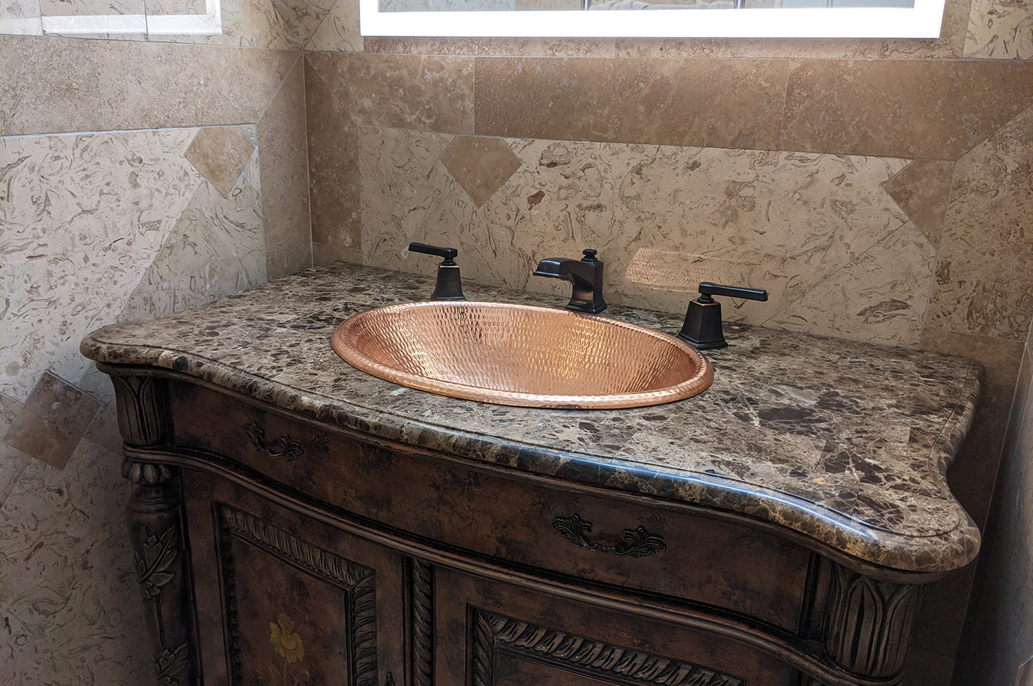 Installation Image of Premier Copper Products 19" Oval Copper Bathroom Sink, Polished Copper, LO19RPC