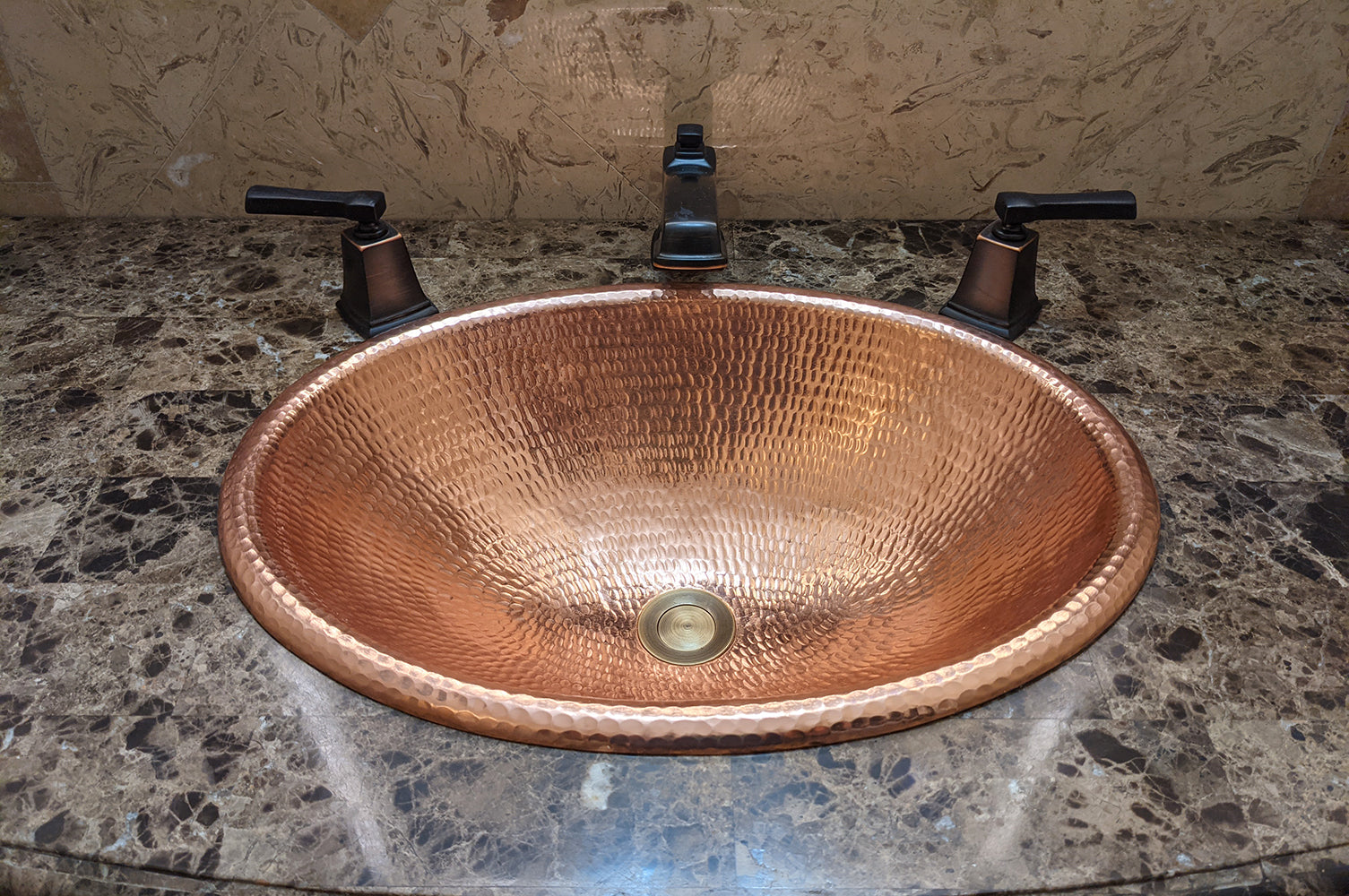 Installation Image of Premier Copper Products 19" Oval Copper Bathroom Sink, Polished Copper, LO19RPC
