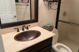 Installation Image of Premier Copper Products 20" Oval Copper Bathroom Sink, Oil Rubbed Bronze, LO20FDB