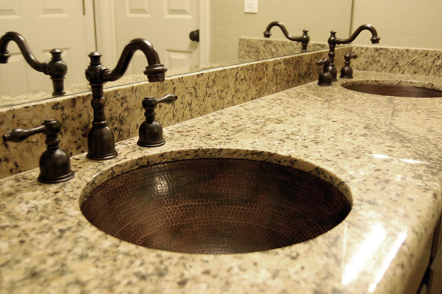 Installation Image of Premier Copper Products 17" Round Copper Bathroom Sink, Oil Rubbed Bronze, LR17FDB
