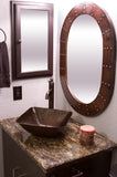 Installation Image of Premier Copper Products 35" Hand Hammered Oval Copper Mirror with Hand Forged Rivets, MFO3526-RI