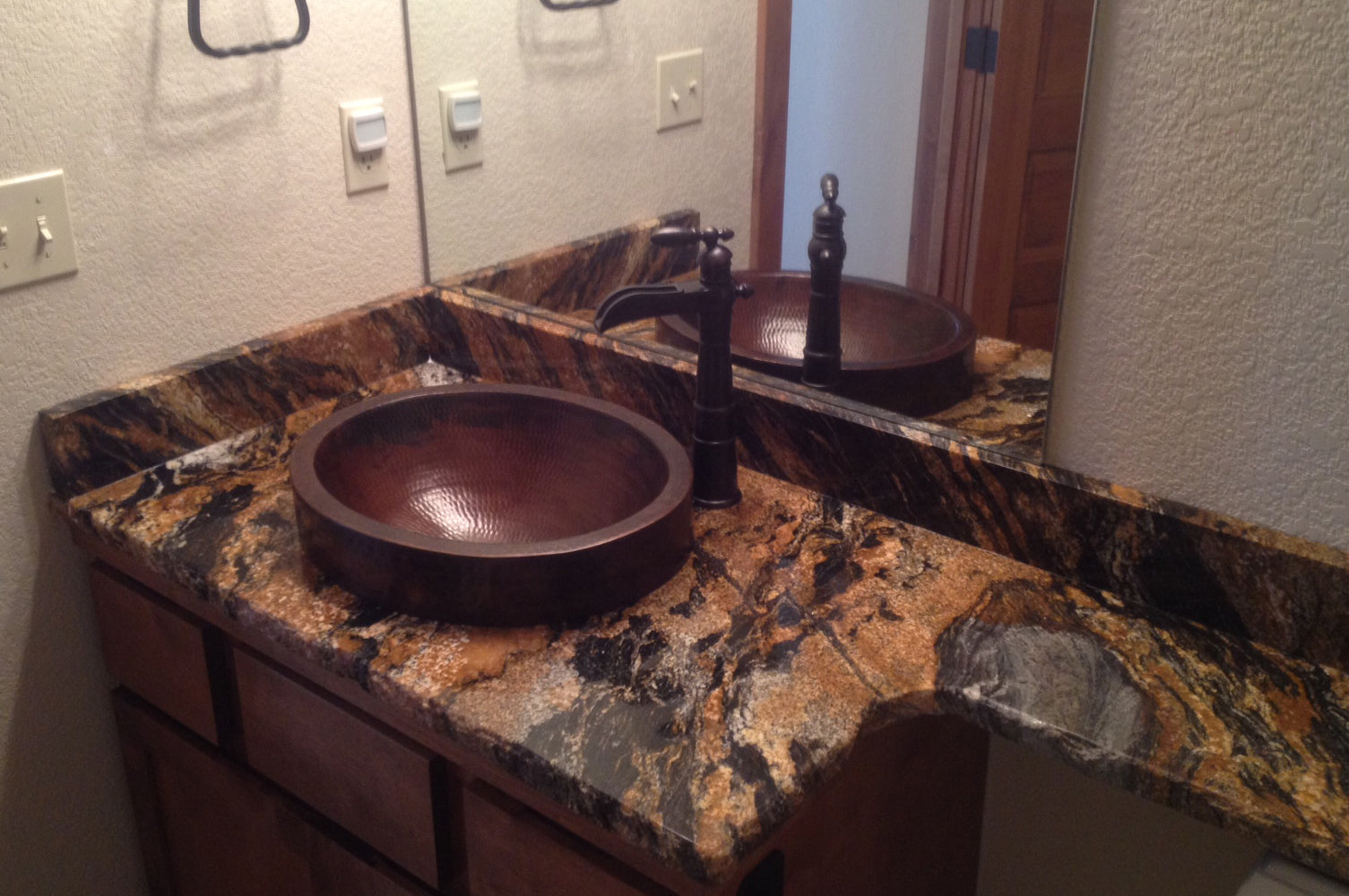 Installation Image of Premier Copper Products 18" Oval Copper Bathroom Sink, Oil Rubbed Bronze, VO18SKDB