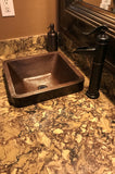 Installation Image of Premier Copper Products 15" Square Copper Bathroom Sink, Oil Rubbed Bronze, VSQ15SKDB