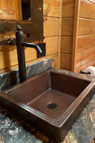 Installation Image of Premier Copper Products 15" Square Copper Bathroom Sink, Oil Rubbed Bronze, VSQ15SKDB