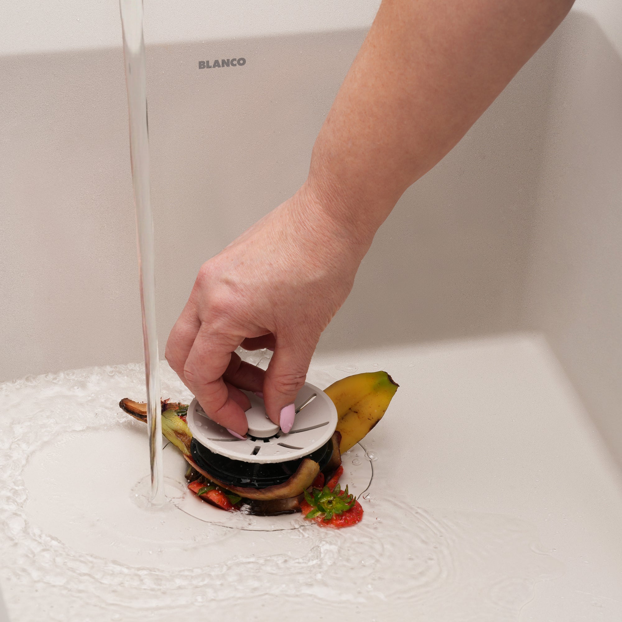 Blanco Essential Silgranit Color-Matched Disposal Flange Drain Insert with Waste Scraper Product Image