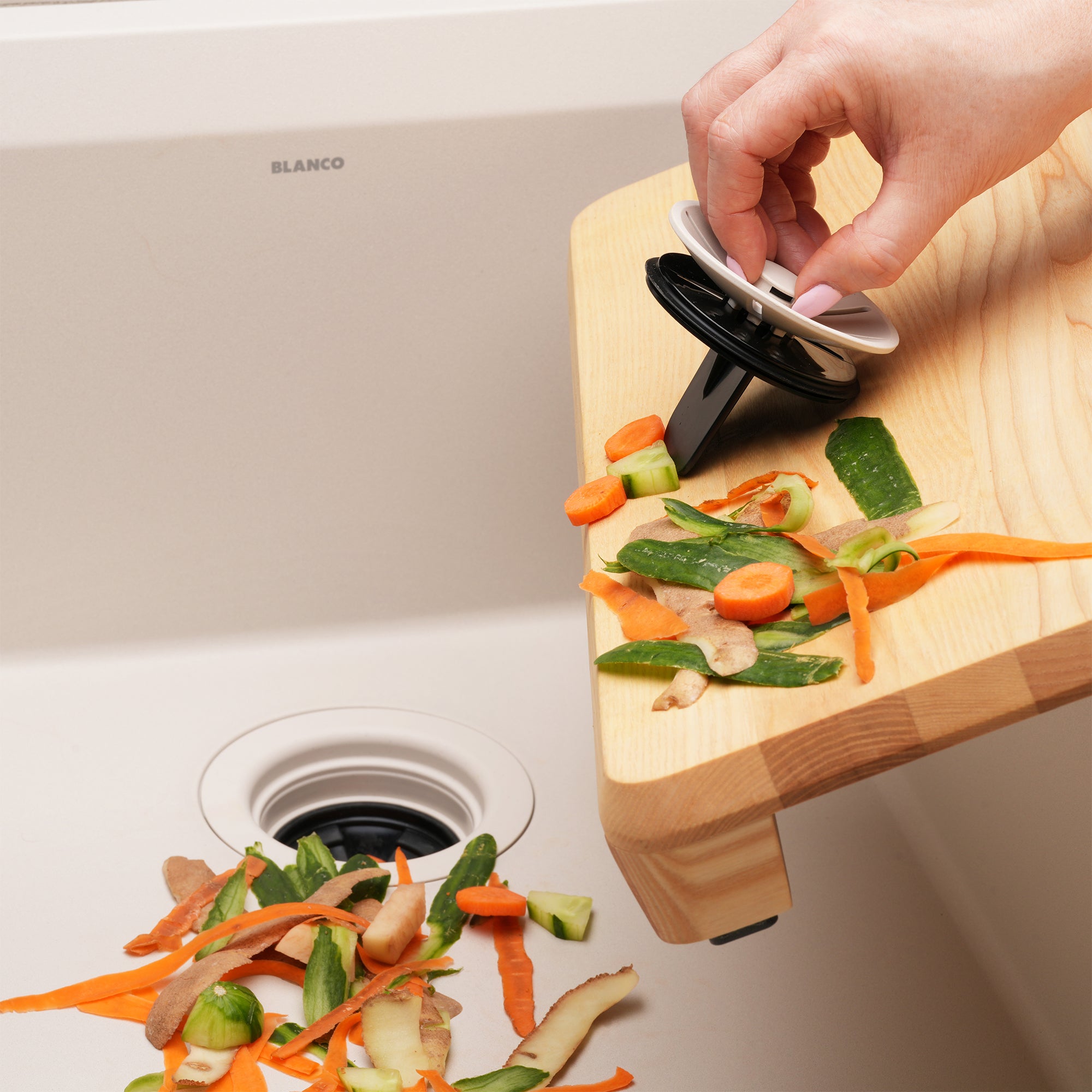 Blanco Essential Silgranit Color-Matched Disposal Flange Drain Insert with Waste Scraper Product Image